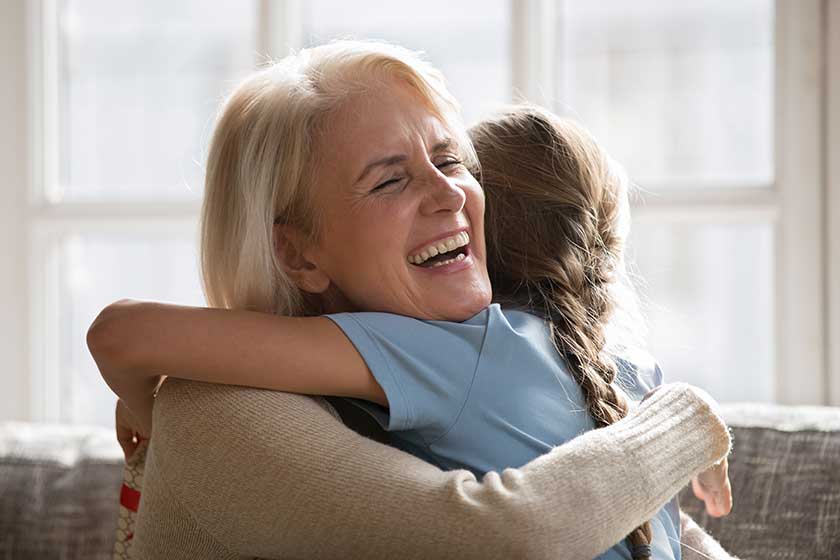 https://www.conservatoryseniorliving.com/wp-content/uploads/2022/06/overjoyed-small-granddaughter-and-mature-60s-grandmother-hug.jpg