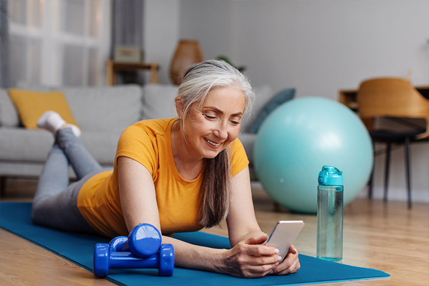 https://www.conservatoryseniorliving.com/wp-content/uploads/2023/01/senior-woman-resting-on-yoga-mat.jpg